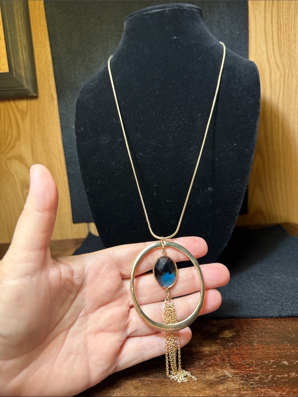 Adjustable Gold-Tone Necklace with Blue Faceted Pendant and Tassel